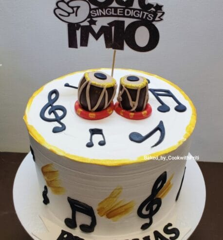 attachment-https://www.bakedbypriti.in/wp-content/uploads/2026/05/Tabla-themed-birthday-cake--458x493.jpeg